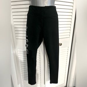 Sport-Tek XS black athletic leggings with local bar logo on leg